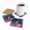 Abstract watercolor coaster set shown with coffee mug for scale.