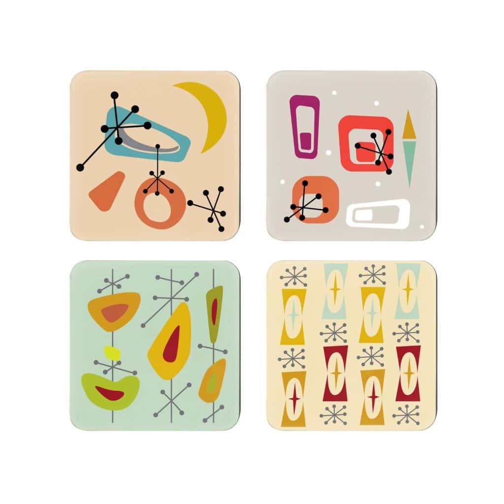 Mid‑century modern atomic print coaster set of 4 photographed flat on a table.