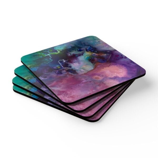 Abstract watercolor coaster set stacked on a table.