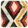 Square coaster with a geometric tribal design.