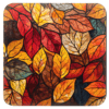 Fall leaves design that looks like stained glass coaster.