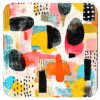 Square coaster with colorful abstract art print on it.