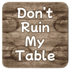 Square coaster with image of wood with water rings on it and text that says 'Don't Ruin My table'.