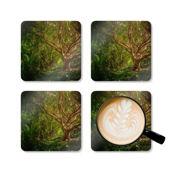 Set of 4 coasters with an image of a large green tree in the forest printed on them. Shown with a mug for scale.