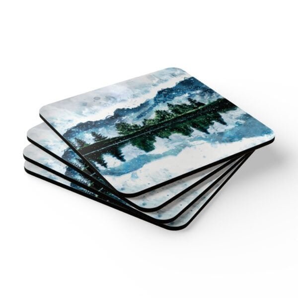 Coaster set with watercolor art print of a mountain, trees and a lake. stacked on a table.