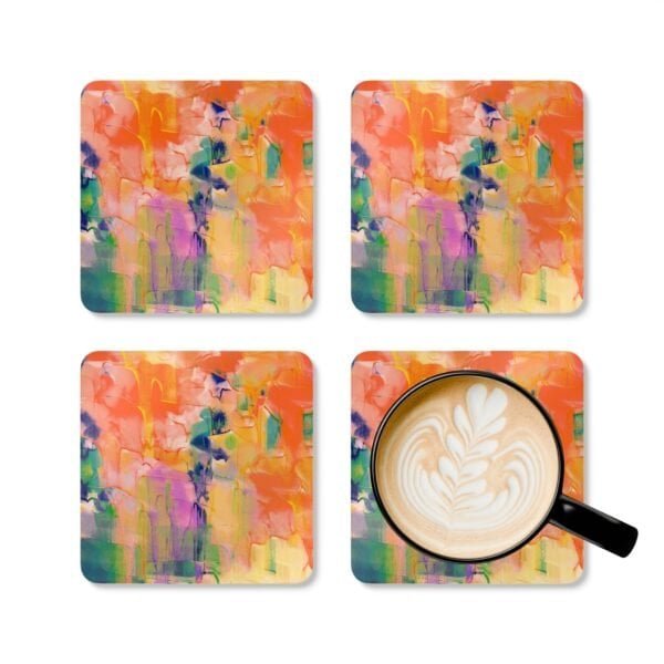 Orange abstract art coaster set shown with mug for scale.