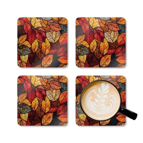 Fall leaves design that looks like stained glass coaster set shown with a mug for scale.
