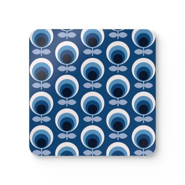 Square coaster with a blue and white mid century modern circle print design.