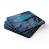 Set of 4 coasters with abstract art print in shades of turquoise blue, black and silver grey. Shown stacked on a table.