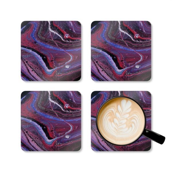 Set of 4 coasters with abstract art print in shades of red, purple, black and white. Shown with a mug for scale.