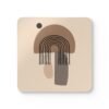 Square coaster with minimalist neutral design in shades of brown, tan and black.