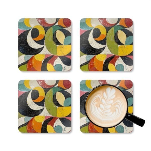 Set of 4 square coasters with colorful abstract art print image on them. Shown with a mug for scale.