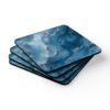 Blue and white marble print coaster set stacked on a table.