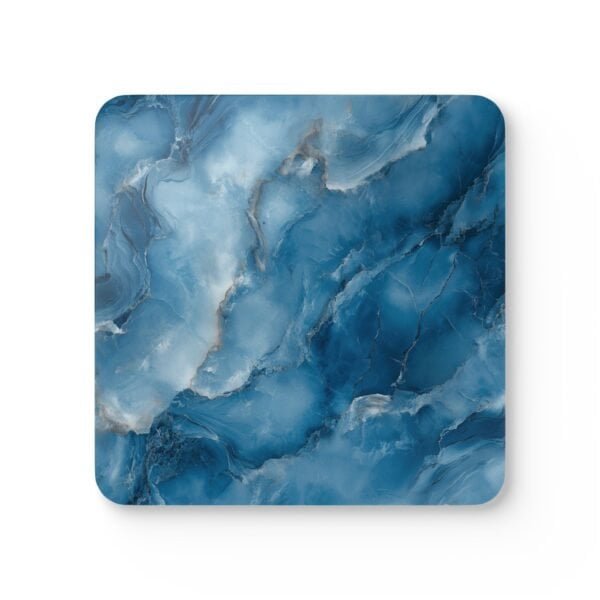Blue and white marble print coaster flat on a table.