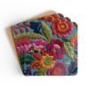 Coasters with image of colorful embroidered boho flowers stacked on a table.