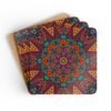 Colorful mandala design coasters shown stacked on a table.