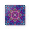 Colorful radiant mandala coaster shown stacked on a table.