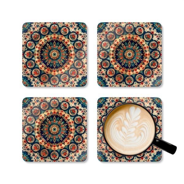 Set of 4 square coasters with image of a red, navy blue and turquoise mandala print. Shown with a mug for scale.
