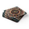 Set of 4 square coasters with image of a red, navy blue and turquoise mandala print. Shown stacked on a table.