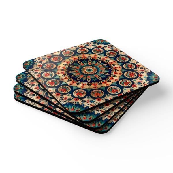 Set of 4 square coasters with image of a red, navy blue and turquoise mandala print. Shown stacked on a table.