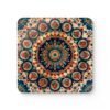 Square coaster with image of a red, navy blue and turquoise mandala print.