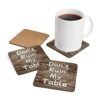 Set of four square coasters with image of wood with water rings on it and text that says 'Don't Ruin My table'. Shown with a mug for scale.