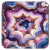 Square coaster with purple, blue, which and gold agate slice design.