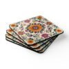 Set of coasters with a boho style floral medallion design with sunflower in the center.