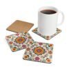 Set of coasters with a boho style floral medallion design with sunflower in the center.