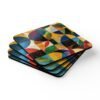 Geometric design print coaster set in jewel tone colors.