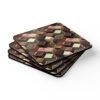 Set of 4 square coasters with a metallic looking geometric cube design printed on them. Shown stacked on a table.