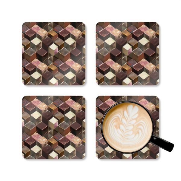 Set of 4 square coasters with a metallic looking geometric cube design printed on them. Shown with a mug for scale.