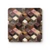 Square coaster with a metallic looking geometric cube design printed on.