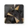 Square coaster with a triangle geometric design in black and gold with some gold glitter effect printed on.