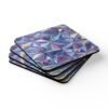 Set of 4 square coasters with triangle geometric design in multi colors that have a subtle holographic look printed on them. Shown stacked on a table.