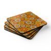 Set of 4 square coasters with 1960's hippie style daisy pattern in orange, yellow, brown and off white colors. Shown stacked on a table.
