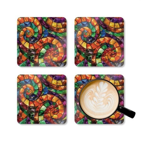 Colorful swirling mosaic glass design coaster set shown with a mug for scale..