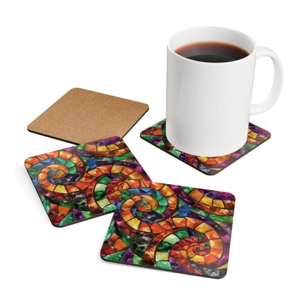 Colorful swirling mosaic glass design coaster set shown with a mug for scale..