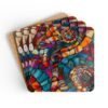 Set of 4 square coasters with a mosaic design in jewel tones. Shown stacked on a table.