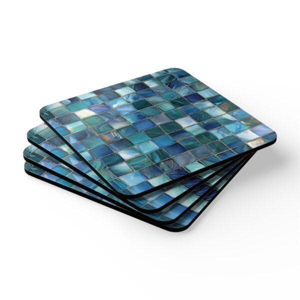 Colorful square mosaic design in shades of turquoise and teals coaster flat on table.