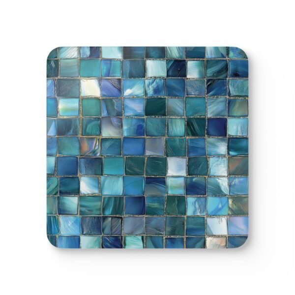 Colorful square mosaic design in shades of turquoise and teals coaster flat on table.