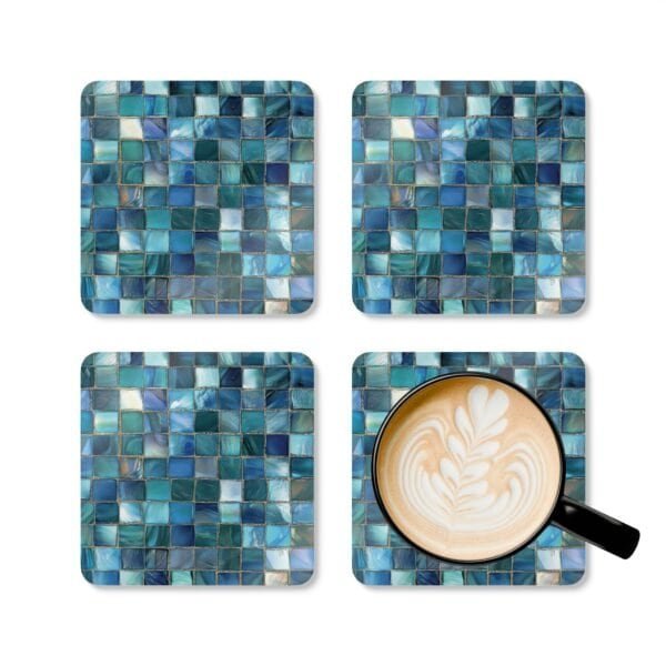 Colorful square mosaic design in shades of turquoise and teals coaster flat on table.
