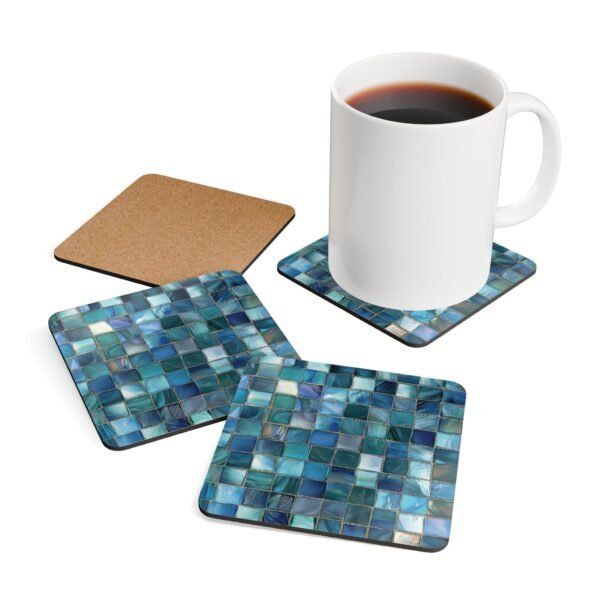Colorful square mosaic design in shades of turquoise and teals coaster flat on table.