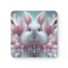 Square white bunny coasters with pink crystals all around.