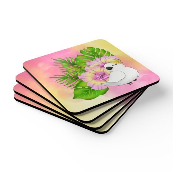 Set of four square coasters with an image of a cute white cockatoo parrot and a pink and yellow watercolor background. Shown stacked on a table.