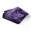Set of 4 square coasters with purple marble print. Shown stacked on a table.