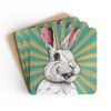 Coaster set with image of a retro comic style white bunny rabbit with aqua and yellow starburst background.