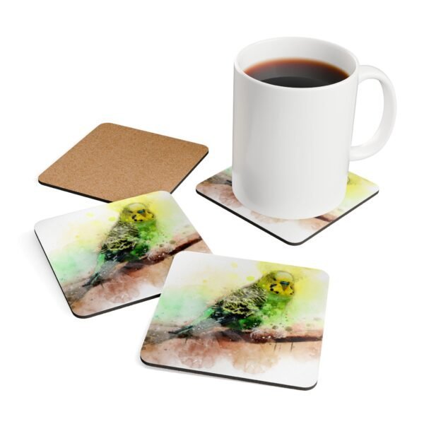 Set of four square coasters with watercolor image of a green and yellow Parakeet printed on each one. They are shown with a mug for scale.