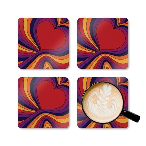 Set of four square coaster with an image of a retro style heart. Shown with a mug for scale.