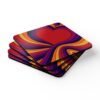 Set of four square coaster with an image of a retro style heart. Shown stacked on a table.